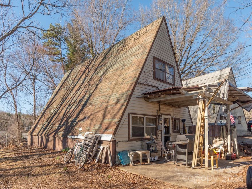 Excellent a-frame investment opportunity. Bring you vision and creativity to uncover new life to this home. Walk to the Hominy Creek Greenway. Minutes to the heart of West Asheville with restaurants, breweries, bakeries, live music and vintage shopping.