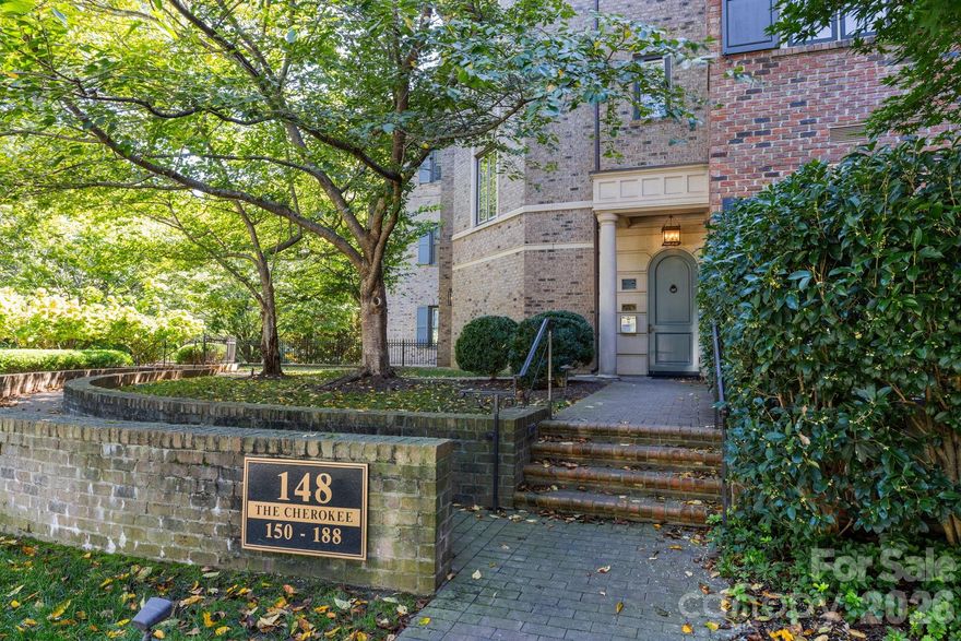Welcome to The Cherokee, a luxury condo building nestled in the heart of Eastover. The building is a perfect combination of quality construction and well planned day to day function. Incredible location. High ceilings, large windows, abundant natural light & custom finishes throughout. This unit is one of the largest floor plans within the building with incredible storage/closets. The floor plan features two large living areas, 3 bedrooms, all with ensuite bathrooms, a dedicated formal dining room and a private office. Both the living room and family room have gas fireplaces. The fabulous kitchen is spacious and open and includes top of the line appliances & a walk-in pantry. Extended kitchen eat-in island with bar seating. Perfect flow between formal and informal living spaces. Primary suite is spacious with linen & walk-in closets and a spa bath with dual vanities, a shower and free standing soaking tub. Wet bar with ice maker and wine fridge connects the kitchen to the formal dining and living rooms.  Laundry room includes extra cabinetry and storage plus the 2nd hallway access. The private covered bluestone porch, located on the back side of the building, is peaceful and perfect for morning coffee or entertaining.  Secured entry to main building lobby and the secured parking garage. Two dedicated parking spaces conveniently situated side by side and directly in front of the designated storage room. Experience the lock-and-leave lifestyle steps away from retail, restaurants and the conveniences of Eastover, Myers Park and Elizabeth. Short commutes to Uptown and the Charlotte Douglas International Airport.