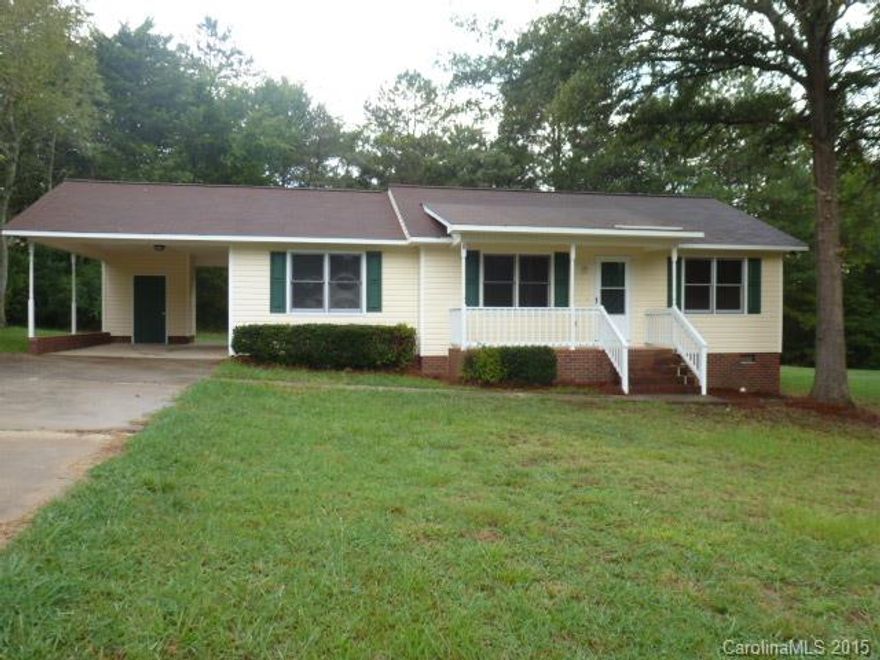 Like new, 3BR, 2BA home, features single attached carport, great lot, nice front porch, replacement windows, deck on back, LR, spacious kitchen with French doors that opens to the deck, laminate floors. Move in ready!