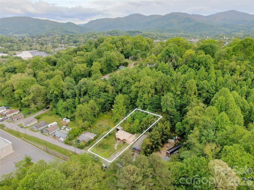 Exceptional Development Opportunity – 4 Unit Potential in the Heart of Waynesville!
Positioned on one of the largest lots on Fraser Street, this prime 0.46-acre property offers a rare chance to capitalize on location, scale, and flexibility. Located in a rapidly growing corridor just off Highway Exit 102, the site is surrounded by major retail, restaurants, and daily conveniences—including Publix, Ingles Markets, Chick-fil-A, and Starbucks—placing future residents within minutes of everything.
The property includes duplex plans tailored specifically for the lot, while current zoning allows for up to four residential units, presenting strong upside for developers and investors seeking density and long-term value. Whether you choose to move forward with the existing plans or maximize the site with a larger multi-unit build, the possibilities here are substantial.
An existing structure is on site and is being sold as-is, with major preliminary work already completed—including asbestos abatement and a demolition permit in place—saving valuable time and cost in the development process. This positions the property for a smooth transition into the next phase of construction.
With its combination of strategic location, generous lot size, development-ready groundwork, and flexible build potential, this is a standout investment opportunity in the heart of Waynesville. Ideal for builders, developers, or investors looking to deliver high-demand housing in a thriving market.
