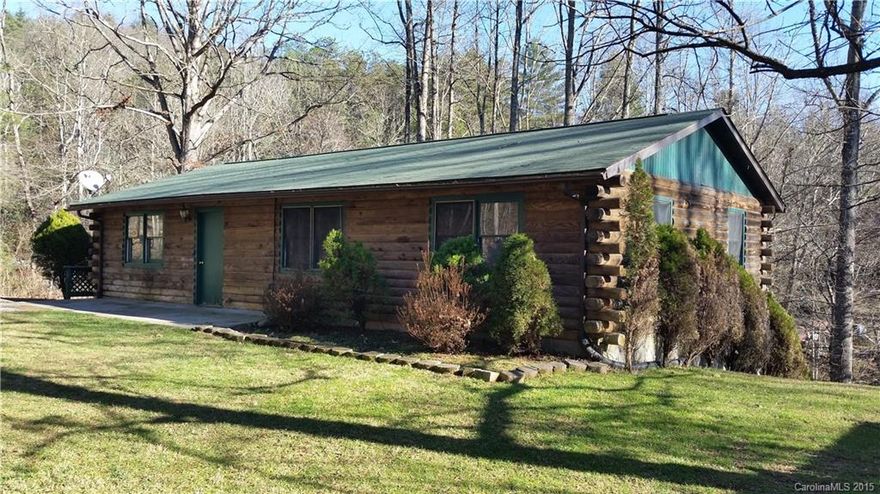 **Multiple Offers. Highest and Best Offer Deadline 03/10/16 at 3pm EST.**  Log cabin just outside of Brevard w/ easy access to Hwy 64 and all Brevard has to offer. Features of the home include an open floorplan, wood floors, level yard area, and a full/walkout/daylight basement that could be heated/finished to expand the living area. Ready for new owners to move-in, update, and make it their own!
