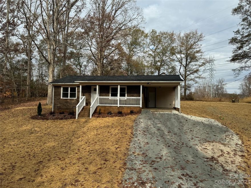 Newly remodeled 2 bedroom 1 bath brick ranch home with over 3 acres.  Home includes all new plumbing, electrical, roof, appliances, vinyl plank flooring, cabinets, granite countertops, windows, doors, fixtures, heat pump, water heater, vapor barrier, bathtub, paint, and more!  Open floor concept with kitchen island.  Two storage buildings.  New landscaping and grass.  Close to the city but with a country feel.