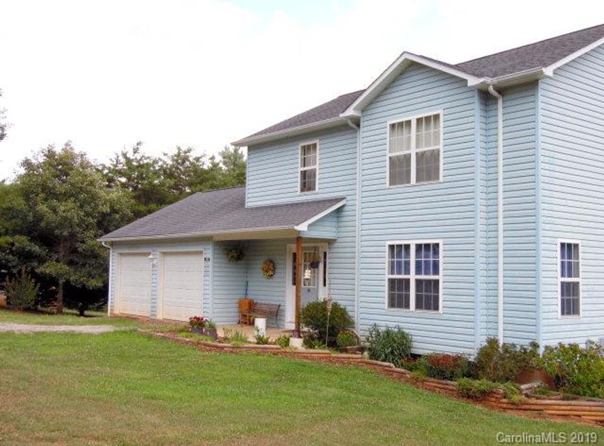 This property features a great back yard with large decks to entertain or plant your garden. Grapes, Pear, Red & Golden Apples and Cherry trees currently on the property. Kitchen features stainless appliances with custom cabinets and a nice pantry.  It also offers an eat-in kitchen and formal dining area.  French doors lead off the kitchen to an oversized deck for grilling. Upstairs features 3 bedrooms, laundry room, coat closet and 2 full baths.  Main living area features living room, kitchen, dining and half bath.  Walk out basement to patio, full bath with bonus room currently being used as 4th bedroom and large family room.  Per owner property set up for generator back up just needs line. Dual system with gas & heat pump. Large out building.  Two car garage that also leads to a smaller outside deck.  Tour it today!