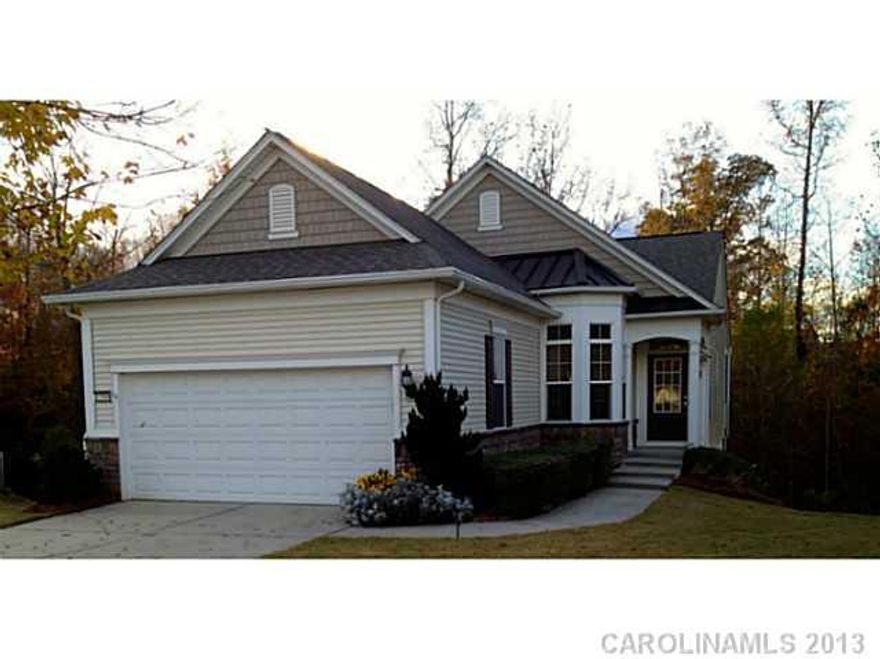 Spacious Gray Myst w/finished walk-out basement.  Hardwoods in Kitchen and Great rm.  Cul-de-sac wooded lot.  The home is move-in ready, freshly painted throughout.  Screened lanai w/deck overlooking wooded yard.  Finished basement w/bedroom, bath, rec rm and tons of storage.  Resort style living, walking trails, indoor/outdoor pool and more.