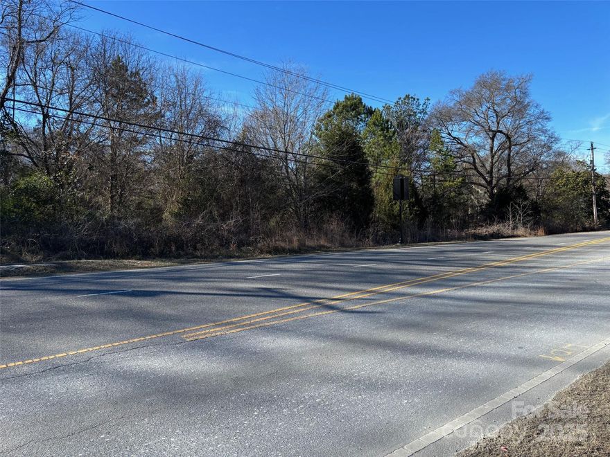 This property has 229 feet of road frontage on Mountain Island Hwy. Perfect location to build that dream home conveniently located in Mount Holly,  being so convenient to Gastonia, Belmont, Charlotte, Denver, only mins away from Charlotte Airport, Downtown Charlotte, White Water Center.