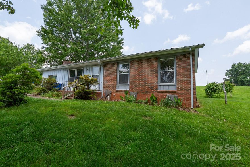 3 bedroom 1 bath 1350 sf brick ranch at the end of a cut-de-sac tucked neatly away on over a half acre lot just behind Johnston Elementary school.  There is an attached survey of the neighbors property which shows that the subject property could be  subdivided and approved for an extra building lot.  The 1967 ranch needs almost everything but appears to be solid and has a metal roof.  The garage was converted into a den.  This is a great opportunity at this price to remodel the old house and build a new one to make it an outstanding two for one purchase.  The land lays flat and grassy, buy it now and be fat and sassy!