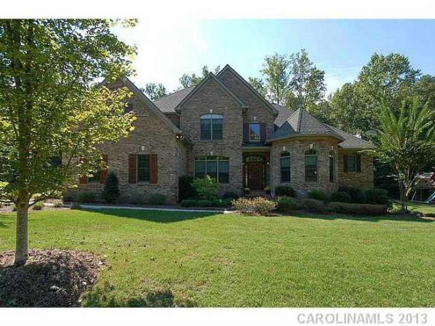 Gorgeous full brick home on a private lot. Gleaming hardwood floors throughout most of main level. Beautiful kitchen w/ granite, stainless steel appliances, warming drawer, built in refrigerator.  Cozy keeping rm w/ beamed ceilings. 2 Fireplaces, 2 story LR. Amazing master suite, massive trey ceiling, jacuzzi tub, steam shower.  Guest suite on main level. Screened porch Too many details to list!