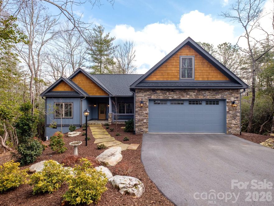 Located at the end of a private cul de sac in Connestee Falls, this custom home built in 2022 offers true one level living with high end finishes and a thoughtfully designed open floor plan. The main level features a spacious primary suite with a large primary bathroom and an oversized walk in closet, along with two additional guest bedrooms and a shared bath. A fourth bedroom and full bath are located above the garage, providing ideal space for guests, a home office, or bonus room.

The living area opens to a covered and screened porch, ideal for enjoying the peaceful setting, while the primary suite offers its own covered and screened porch with a hot tub that conveys. The very level lot includes a fenced backyard, making it well suited for pets and outdoor enjoyment. The property also features a large unfinished crawl space offering excellent storage. Conveniently located close to the clubhouse and community amenities, this home combines privacy, usability, and a prime location within the community.