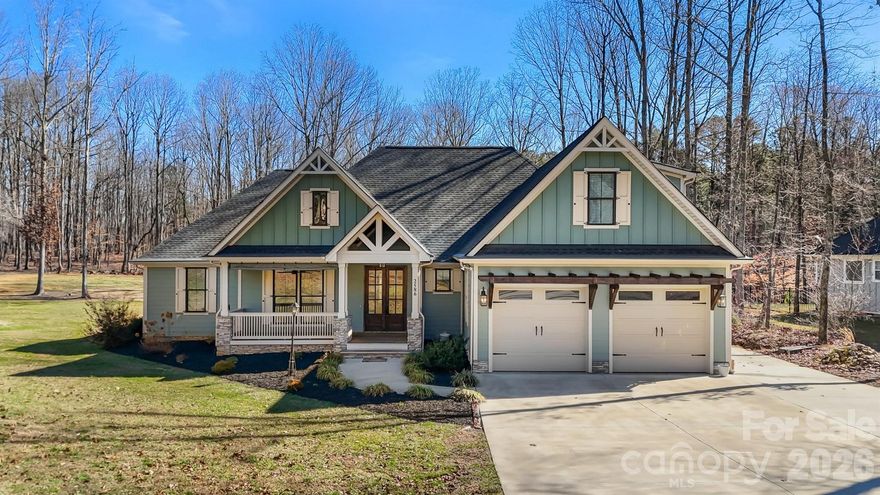 If you’ve been craving modern farmhouse style with room to breathe but still want easy access to everything then look no further!
Set on 1.3 peaceful acres, this thoughtfully designed home offers the rare convenience of 4 bedrooms and 2.5 baths on the main level, creating effortless everyday living. Only the spacious bonus room sits upstairs - perfect for a media space, home office, or private retreat.
At the heart of the home, the chef’s kitchen makes a statement with its oversized island, gas cooktop, wall oven and microwave, abundant cabinetry, and open shelving. It flows beautifully into the inviting living room where a gas log fireplace and built-in bookcases create a warm and cozy spot to gather.
The primary suite feels like a true escape, with a spa-inspired bath featuring a soaking tub and generous walk-in shower. This space was designed to slow down and unwind.
From the three-season room (complete with its own mini split) to the expansive deck overlooking the backyard, this home was made for quiet mornings, sunset evenings, and hosting the people you love.
Beyond beauty, this home offers meaningful upgrades: acrylic-finished garage and sunroom floors, a Kinetico whole-house water purification system, Gutter Helmet leaf guards, and a fully encapsulated crawl space with dehumidifier to provide comfort, efficiency, and peace of mind.
And the location? Just 15 minutes to downtown Lincolnton, 40 minutes to Uptown Charlotte, 30 minutes to CLT Airport, and 15 minutes to a Lake Norman boat launch. 
Space. Style. Smart upgrades. And the convenience you didn’t think you could find on acreage.
This one feels different - because it is!