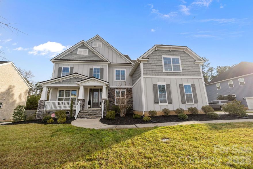 Welcome home to this stunning 5 bed, 5 bath home in the highly sought-after Habersham community. This home offers an exceptional blend of space, style, and comfort. A grand two-story entry foyer welcomes you inside, while the inviting front porch sets the stage for rocking chairs, sweet tea, and classic Southern living. The main level features an inviting open-concept layout with rich wood floors, a spacious living room with a cozy gas fireplace and built-in shelving, as well as a gorgeous chef’s kitchen with an oversized quartz island, gas cooktop, double ovens and ample storage. A formal dining room is ideal for entertaining, while an informal dining area overlooks the backyard and opens directly to the deck for seamless indoor/outdoor living. The main-level guest suite is thoughtfully designed for privacy and comfort, featuring a spacious bedroom, a full en-suite bathroom, and ideal separation from the main living areas, perfect for hosting guests, multigenerational living, or even a private home office. A convenient drop zone just off the garage adds everyday functionality.
Upstairs, you’ll find generously sized bedrooms and flexible living spaces, including two bedrooms connected by a Jack-and-Jill bathroom and an additional bedroom with its own private en-suite. The primary bedroom features access to a second-level private deck—perfect for morning coffee or a relaxing evening drink and a peaceful retreat. The spa-like primary bathroom offers a walk-in shower and a soaking tub, creating a true owner’s escape. A large bonus room provides additional space for a media room, playroom, or home gym, while oversized closets throughout offer excellent storage and comfort.
Habersham offers resort-style amenities including a pool and clubhouse, sidewalks and walking trails, streetlights, and a tranquil pond with a dock for fishing. Conveniently located just minutes from I-77, shopping, dining, and top-rated schools, this home provides easy access to Charlotte and delivers the best of comfort and community living.