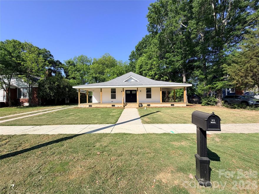 Welcome to 308 N Catawba Street, a beautifully updated home just minutes from the heart of downtown Lancaster. This 3-bedroom, 3-bath home plus a dedicated office offers 1,720 square feet of thoughtfully designed living space on a spacious 0.35-acre lot.

Inside, you’ll find an open and inviting layout with luxury vinyl plank flooring, recessed lighting, crown molding, and fresh neutral finishes throughout. The modern kitchen features quartz countertops, stainless steel appliances, ample cabinetry, and a large island perfect for entertaining. Each bedroom is generously sized, with updated bathrooms showcasing stylish vanities and tiled showers.

Outside, enjoy a welcoming front porch, a rear deck for relaxing or entertaining, and a detached garage with a long driveway offering plenty of parking and storage. The oversized lot provides privacy and flexibility for outdoor living while still being conveniently close to shops, dining, and local attractions downtown.

This move-in-ready home blends modern updates, space, and location — a rare find in one of Lancaster’s most desirable areas.