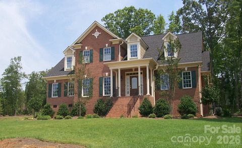 Photo of 1016 Firethorne Club Drive, Waxhaw, NC 28173 (MLS # 4393647)