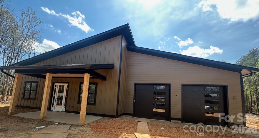 New Barndominium on large lot in fast growing area of Catawba County. Features 2016 SF 3BR 2BA home w open plan, gas FP, laundry rm, covered porches. The oversized 1396 SF garage features 2 ton ductless mini split, (3) 10x9 garage doors, epoxy floors. Perfect for the hobbyist or home occupied business.