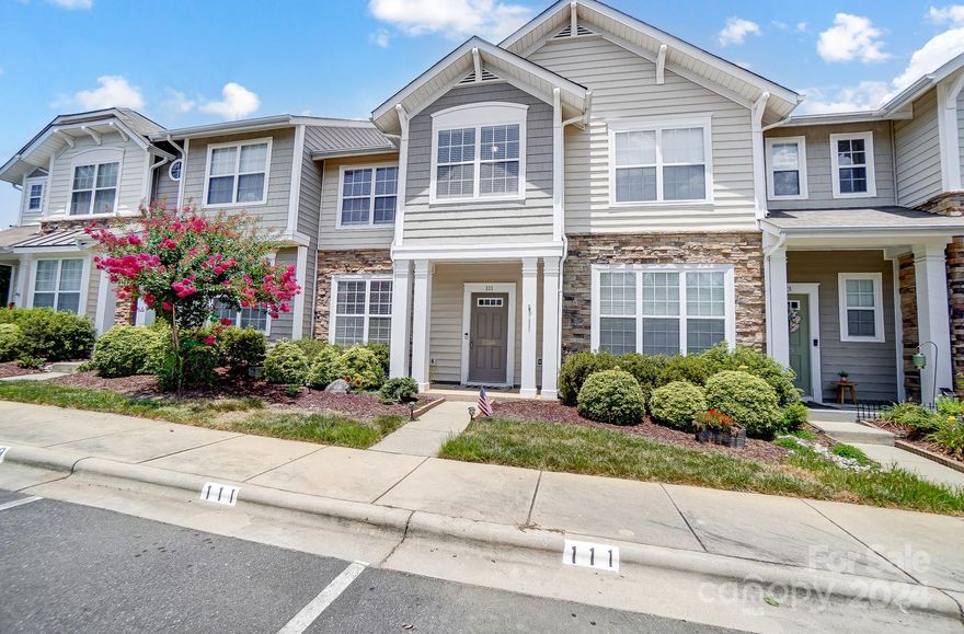 Popular Coventry townhome ready to move right in!  Stainless steel appliances & white kitchen cabinets with white subway tile.  Pantry, built-in microwave and smooth-top stove.  Refrigerator, washer & dryer to remain for buyers. Bright open floorplan with newer LVP flooring on the main level. Updated lighting fixtures.  Great room with cozy gas log fireplace.  Carpet upstairs & HVAC both new in 2020.  Walking distance to community pool. Roof replaced in 2011. Privacy enclosed brick patio & exterior storage. Covered front porch. Convenient sought-after Fort Mill community minutes from Lake Wylie, interstate access, shopping and Anne Springs Close Greenway!