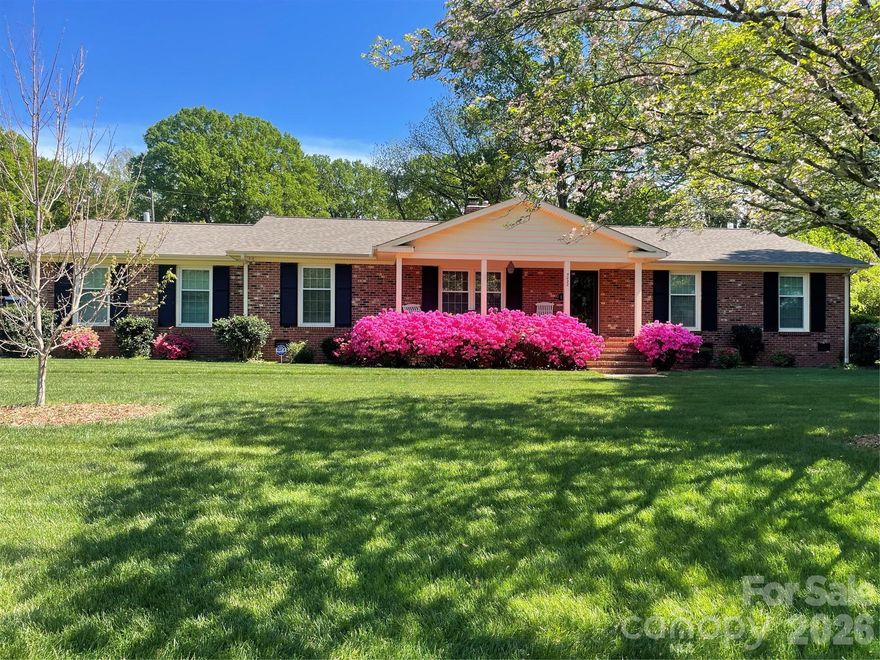 Elegant, traditional full-brick ranch situated on nearly half an acre with a fenced yard. This well-maintained home features professional landscaping and numerous recent updates, including: Roof: Replaced in 2025; HVAC: Replaced in 2021; Stainless Steel Appliances: Installed in 2023; Windows: Replaced in 2020; and Water Heater: Replaced in 2021.  The interior includes a primary bedroom with a white-tiled ensuite bath and a second full bath also featuring white tile. The property has been professionally pre-inspected and is in good condition, making it ready for you to move in and make it your own. Conveniently located just five miles from Uptown Charlotte, the home offers easy access to I-77 and is close to Camp North End. ESTATE: SOLD "AS-IS" with no repairs to be made by the seller.