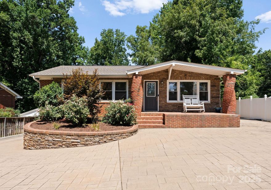 Fall in love with this charming 5 bedroom, 2 bathroom brick home. Nestled in a prime location near vibrant Uptown Charlotte and trendy Plaza Midwood, this home offers dual living spaces for two potential rentals. Step inside where the open concept seamlessly unites the living room and kitchen, perfect for entertaining or cozy gatherings. The basement apartment, complete with a second kitchen, offers potential Airbnb income. The owners previously rented the basement apartment for $1,300 per month to long-term tenants. A generous fenced yard featuring a fire pit and private patio, sets this home apart as truly unique!