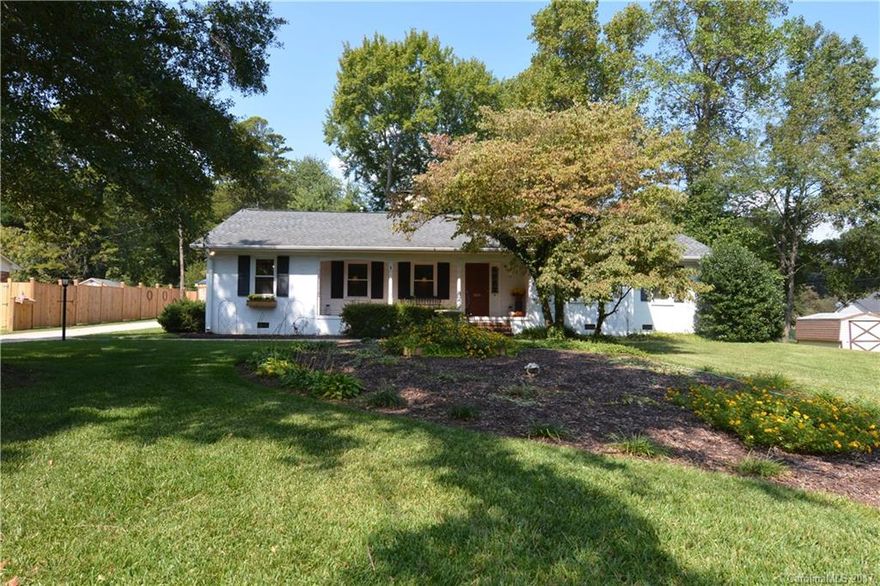 Completely remodeled brink ranch, sun room, farm kitchen with granite counter tops, ship lap walls, hardwood floors throughout home, updated baths, and 2 wood burning fireplaces.  New roof in 2013, brand new windows throughout home, new HVAC, crawl space newly lined, new insulation in crawlspace and attic. 2 car detached garage with workshop in the back plus detached large workshop.