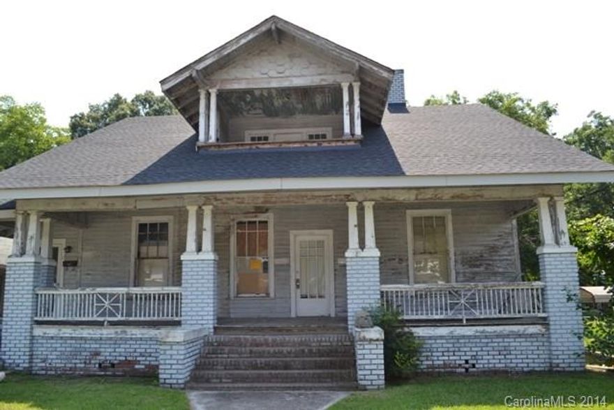 Neighborhood is zoned commercial.  Framed house lap siding, currently duplex but set up as a triplex.  All three units rented around $1,100 a month.  New roof in 2001.  Needs a lot of work.  Tons of potential!