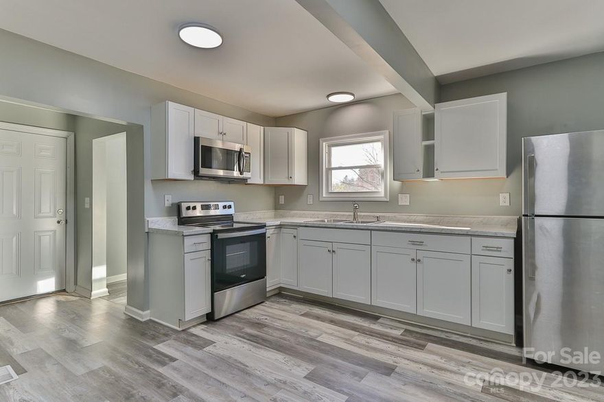 This charming 1500 sq ft 3-bedroom, 2-bathroom residence offers the perfect blend of comfort and convenience. Upon entering, you'll be greeted by a spacious living area, creating a warm and inviting ambiance. The well-appointed kitchen boasts modern appliances, ample counter space, and plenty of storage, making meal preparation a breeze. The primary bedroom is a peaceful retreat with its generous size. Two additional bedrooms provide versatile spaces for guests, a home office, or a growing family. The 2nd bathroom is well-appointed with all the necessary amenities. The large lot offers endless possibilities to personalize your outdoor oasis. This home is not only beautiful but also practical, featuring a large laundry room, ample storage, and central heating and air. Don't miss the opportunity to make this wonderful property your new home. Schedule a showing today and explore all that the home has to offer! NEW ROOF BEING PUT ON JAN 11, 2024