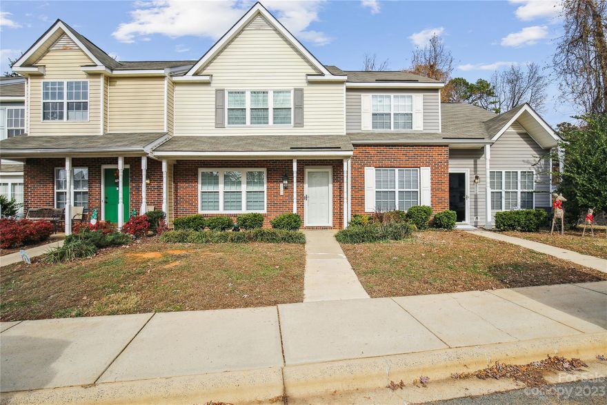 Back on the market!  There is NO rental cap at The Landing at Hickory Grove.  Home inspection and appraisal have been done on the property.  Listing price reflects updates/replacements on this townhouse.  Townhouse features many updates from new high end windows, granite countertops in kitchen and bathrooms, LVP Flooring, tile in kitchen, white subway title backsplash, white kitchen cabinets, new electric panel with all new fuses and whole home surge protector, stainless steel appliances, fenced backyard, upgraded closets to maximize space and a feature wall in second bedroom.  Bathrooms in both primary and second bedroom.  Popcorn ceiling has been removed.  Gas fireplace to your left when you enter townhouse.  Perfect for entertaining and low maintenance.  HOA is $187.20 a month and covers outside maintenance, water, sewer, trash and outside pool in community.  HOA also covers the building exterior and roof.   Storage closet  in back of townhouse.