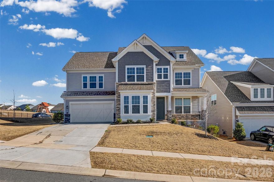 Looking for a home with your own private theater. You won't find a home like this anywhere else in Charlotte with special lighting, brand new reclining chairs, theater surround sound, glow in the dark theater carpet,  along with its own concession stand and theater projection system.  There are several other custom features within this 5 bedroom 5 bathroom layout. Enjoy a beautiful marble stone fireplace, a double picketed fence which covers your entire backyard which is large enough to fit two swimming pools, custom designed closets, new porcelain waterproof flooring on the entire bottom floor, new wall paint and 2 EV charger stations. This house is very spacious throughout with an open floor plan and tall entryways to include a guest room and a french door office.