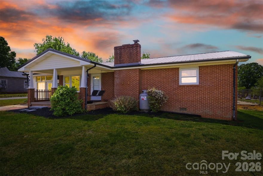Welcome home to this charming two-bedroom, one-and-a-half-bath gem that's ready for its next chapter. Come inside and enjoy a comfortable layout with a large bonus room that can flex to fit whatever you need; home office, hobby space, or a cozy lounge area! Outside is where things really shine. The level, open lot gives you plenty of room to spread out, and the partial fenced-in yard is perfect for pets or weekend cookouts. You'll also find a carport for easy covered parking, plus a garage with power that's a dream for any project! And then there are the mountain views. Whether you're sipping coffee on a quiet morning or winding down after a long day, those rolling Blue Ridge mountains never get old. With local dining spots like Treat and Merrill Mischief just a short trip into Morganton, you'll have plenty to explore within minutes! Schedule your showing today and come see it for yourself!
