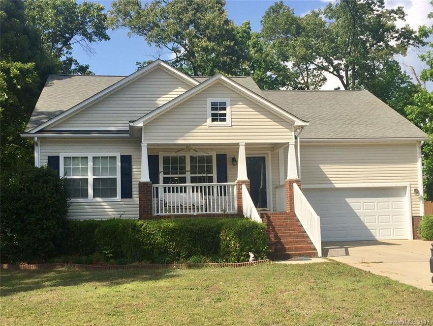 Awesome 3BD/2BA 1.5 story home-conveniently located close to I-77 and Dave Lyle Blvd shopping & dining.  Vaulted ceiling in great room w/fireplace, open floorplan. Huge bonus room upstairs w/storage space.  Kitchen/dining room combo leads to screened porch w/ceiling fan. 2-Car, insulated garage. Large, level, fenced-in rear yard w/patio & trees. Desirable homesite w/privacy. Washer, dryer, fridge, & propane gas grill to convey. Highly sought after location, don't miss out on this wonderful home!