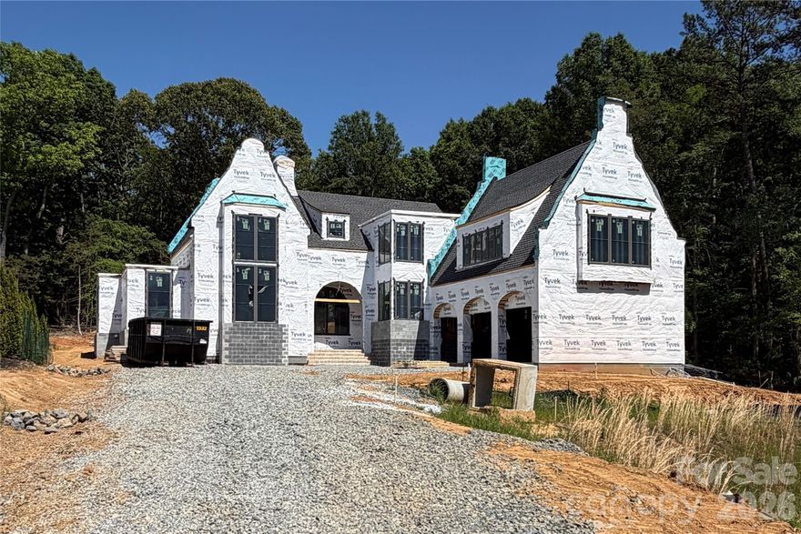 The Belfast Manor is a prestigious residence designed by Mermans Architecture and Grandfather Homes featuring 5 beds, 5 full and 2 half baths. This home is an entertainer's dream showcasing large terrace with wood-burning fireplace plus pool/spa and pool casita with outdoor kitchen, storage, and pool bath. The jaw-dropping main kitchen features walk-in scullery with secondary appliances and plenty of seating at the generous island, dining area, or breakfast nook. Main-level primary suite with soaking tub, tile shower, oversized WIC, plus optional sauna. Main level office or guest suite. Second level features three spacious bedrooms, each with en-suite bath and WIC, plus rec room with powder bath. Situated on an elevated culdesac lot at the back of the neighborhood, buyers can customize design and finishes with our expert team to create a home tailored to their lifestyle.