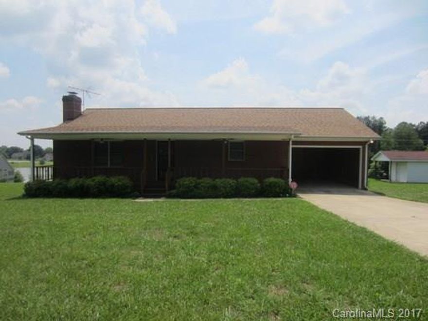 Very cute 2 bedroom, 2 bath brick ranch with 2 car garage and storage building. Home features, hardwood floors, large living room, granite counter tops in kitchen, lots of cabinets in kitchen, storage room, appliances. Located in a lovely country area.