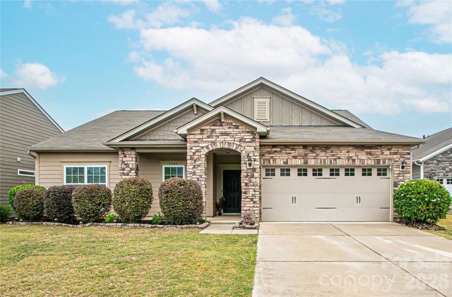 Enjoy the charm of this quiet neighborhood from your covered, rocking-chair front porch before stepping inside to a home filled with abundant natural light. Thoughtfully designed for effortless one-level living, this layout features a spacious kitchen and an open family room that flow seamlessly onto an oversized patio and a flat, fenced backyard—ideal for relaxing or entertaining. The primary suite is tucked away from the secondary bedrooms, offering a peaceful retreat when the rest of the home is lively. Beautiful wood floors enhance the main living areas, while tile flooring adds durability and style to the bathrooms. Conveniently located just minutes from I-485, the airport, Uptown, shopping, restaurants, and entertainment, this address offers both comfort and accessibility. A wonderful blend of tranquility and convenience awaits.