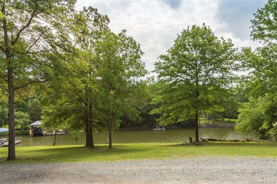 Come quick and check out this charming waterfront on a serene cove in the heart of Lake Wylie! Enjoy nature and the beautiful view from the huge sunroom and living room! Hardwoods and tile throughout. Lots of natural light throughout the home.