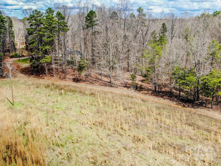 *Lis Pendens has been filed and may delay closing* Iredell Co. Clerk of Court ordered "COMMISSIONER SALE"(23 SP 0211)."AS IS/WHERE IS" w/NO WARRANTIES/GUARANTEES EXPRESSED/IMPLIED BY COMMISSIONER OR HER REPS. Commissioner functions as Seller on behalf of the Court. Initial Down Payment money held by Commissioner, returned AFTER closing/upon upset bid. NOTE:5% Deposit NOT credited at closing! Deposit checks returned to Bidders by Iredell County Clerk of Superior Court bookkeeping dept. NOT subject to financing, appraisal, due diligence period. SALE SUBJECT TO COURT APPROVAL! Brown's Rink Drive private 45 ft perpetual easement. Treed tract with 250' frontage on Browns Rink Dr. County taxes. *Offer $165,375.00 accepted. Upset offer requires bid of minimum 5% ($173,643.75) & 5% deposit ($8,682.19). Bid period ENDS Mon, Sept 23th @5pm*