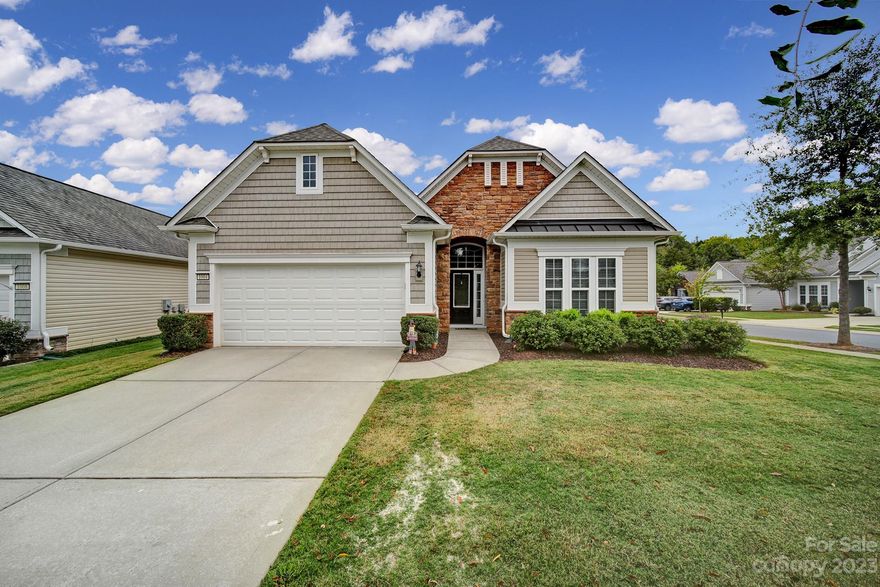 Don't miss this Willow Bend in amenity-filled Sun City! This home sits on a corner lot & has a lovely 3-season room & paver patio. The kitchen has pre-finished wood flooring & features SS Kitchen Aid appliances, a 5-burner gas cooktop, cabinet roll-outs, a lazy Susan, wall oven & microwave, an island, pantry, & a desk area! Eat meals at the island, the breakfast nook, or in the dining area! The open great room has crown molding & a cozy gas-log fireplace. The primary suite features a tray ceiling & ensuite bath w/ a dual sink vanity, walk-in shower, & a spacious closet! A guest bedroom is at the front of the home w/ access to a hall bath. Double glass doors open to an office- great for working or for a hobby room! Relax in the spacious 3-season room (w/ a fan, pull-down sun shades, and new windows). Entertain on the large paver patio w/ sitting walls while watching the sunset! 2-car garage w/ epoxy flooring & storage! Come join the active-adult lifestyle of Sun City!