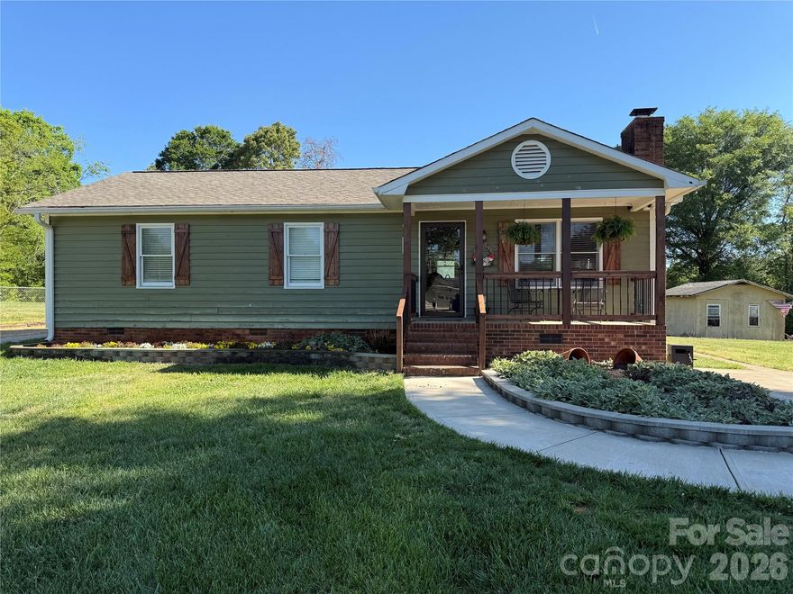 First time home buyers, or downsizers...this is your home!  Step inside this updated 3 bedroom, 1.5 bath home and you will immediately feel the love that this home has been given.  Vinyl plank flooring in all but the bedrooms.  The kitchen is just beautiful featuring white cabinets, granite tops, stainless steel appliances, and an eat on bar as well as a dining area.  The primary bedroom enjoys two closets, one being a walk in, and a private half bath with granite top.  The full bath is conveniently located in the bedroom hall.  Ladies, you will love the many upgrades in the home, but guys...you're gonna LOVE the shop building!  That's right, a man's paradise is found in this 24x25 building that is insulated, heated, and has water already ran!  Great storage and tons of possibilities!  Single car garage door is just an added bonus!  This place is easy to love!