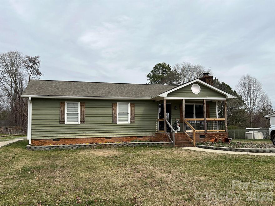 First time home buyers, or downsizers...this is your home!  Step inside this updated 3 bedroom, 1.5 bath home and you will immediately feel the love that this home has been given.  Vinyl plank flooring in all but the bedrooms.  The kitchen is just beautiful featuring white cabinets, granite tops, stainless steel appliances, and an eat on bar as well as a dining area.  The primary bedroom enjoys two closets, one being a walk in, and a private half bath with granite top.  The full bath is conveniently located in the bedroom hall.  Ladies, you will love the many upgrades in the home, but guys...you're gonna LOVE the shop building!  That's right, a man's paradise is found in this 24x25 building that is insulated, heated, and has water already ran!  Great storage and tons of possibilities!  Single car garage door is just an added bonus!  This place is easy to love!