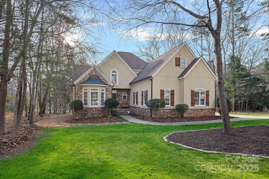 Back on Market in Oxford Place w/a gorgeous Updated Primary Bath & other Repairs completed!! This gorgeous 4 bed/3.5 bath w/pool & tons of privacy is on almost an acre lot will not disappoint. Main level features an open floor plan with updated flooring, paint, kitchen cabinets, large sitting island, leathered granite countertops & breakfast eating area, large living room w/natural light & tall ceilings. French doors open to the office, formal dining room, laundry & 1/2 bath. Main floor primary bedroom w/walk-in closet & sitting area overlooking the backyard. Upstairs you will find 3 BRs, 2 BAs, and a large loft. Outside you will love the privacy of the large deck, inground pool, pool building for the equipment, irrigation in front, and more.  Located in award-winning Fort Mill school district, centrally located close to the shops and restaurants in Indian Land, an easy commute to Charlotte and Rock Hill, restaurants, and shopping. VA transferable loan to qualified buyers, 5.625% Rate