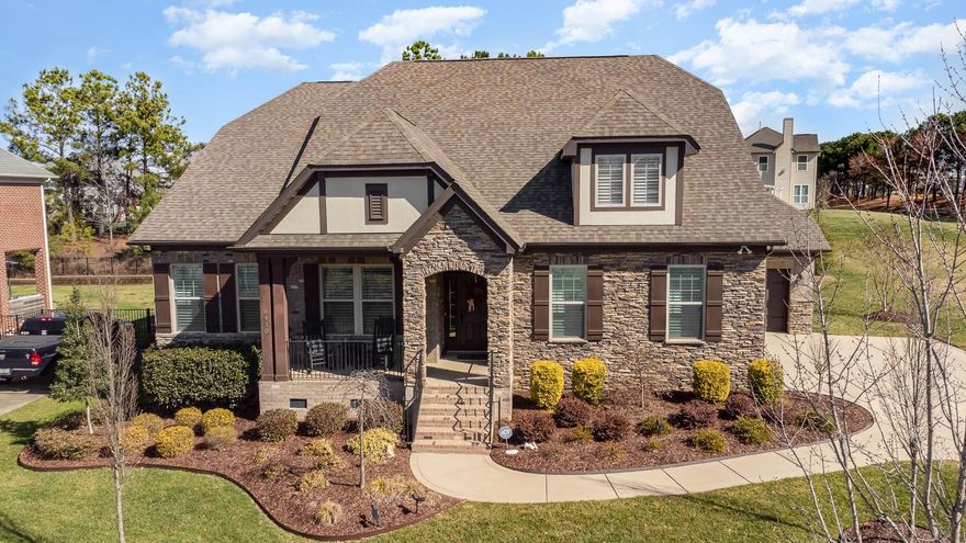 MULTIPLE OFFERS RECEIVED! HIGHEST/BEST OFFERS DUE SAT, 2/18 @ 5pm!  Luxury, resort-style living in SKYBROOK w/TWO MASTER SUITES on the main level! Golf, Pool, Tennis, Fitness Center & Sports Courts! Move-in ready w/open floorplan that is perfect for entertaining! Enjoy cooking for family & friends in the gourmet kitchen w/42" cabinets, upgraded appliances, gas cooktop & HUGE kitchen island. Host the best cookouts in the neighborhood on custom patio or drink your morning coffee on the covered porch overlooking the professionally landscaped, private yard.  Relax at the end of the day in the main level primary suite w/tray ceiling, bay window, custom closet & frameless shower.  FR w/stone fireplace & coffered ceiling.  Hardwoods, 10ft ceilings & crown molding throughout 1st floor.  Large secondary bedrooms w/closet systems. Unfinished attic space could be the man cave of your dreams or 5th bedroom. Formal LR & DR.  Convenient main level laundry & tons of storage! 3-car garage! Must see!