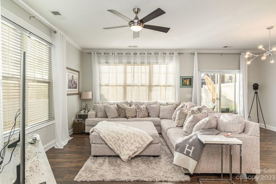 Prime location mere minutes from shopping, dining, and major highways. This exceptional end-unit townhome situated in Davis Lake offers a captivating living experience. The main level unfolds with an inviting open layout, seamlessly connecting the living room, dining area, and a gourmet kitchen adorned with an island, soft-close cabinets, a gas stove, and a convenient walk-in pantry. Complementing this level is a stylish home office boasting new floors. Ascending to the upper level reveals the expansive primary suite, featuring a lavish bathroom showcasing a double sink vanity, a generously sized shower, and an expansive walk-in closet. A spacious loft effectively separates the primary suite from the 2 additional bedrooms. Conveniently situated laundry room steps from each bedroom. Natural light accentuates various updates, including fresh paint. The exterior is enhanced with a privacy fence with astroturf, offering a private oasis. HOA manages lawn care and ext maintenance.