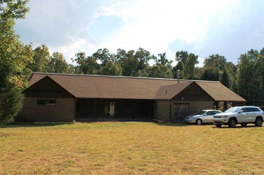 Private country living on 72.70 acres with a private pond!  Unique home built by owners. Solid mahogany doors throughout. Island Kitchen with huge walk-in pantry, SS hood, & slate floor. Tongue & groove white-washed ceiling in Kitchen & Great Room. Separate office in addition to 3 bedrooms. Solar panels, wood burning stove, & thermal htg & cooling system to reduce power bill. Detached shop, old barn, & open covered shed on property. Perfect for farming, equestrian, or developer.