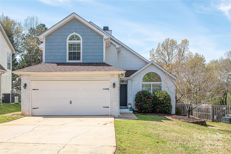 Enjoy wonderful lake living at it's best! Includes EXCLUSIVE OWNERSHIP OF GATED DOCK AND DEEDED BOAT SLIP WITH A 7,500 LB LIFT only 2 years old! Beautifully updated home located in .4 acres and a short walk to  boat slip. Dramatic 2 story entrance leads into a spacious living room and dinning room w/ soaring vaulted ceilings and lots of natural light.  Kitchen was updated with granite countertop, tile backsplash and S/S appliances. Breakfast room and family room are right off the kitchen offering a nice open floor plan perfect for relaxing. Upper level has 4 beds/2baths. Beautiful primary bath updated with a huge walk-in shower, double vanity, walk-in closet. Enjoy the outdoors on an expansive deck perfect for entertaining. Home and deck are freshly painted. New plumbing 2021. NEW carpet and pad 2021. Large, flat, fenced yard w/ storage shed located outside the fenced area but inside the property line. Great location! Near Premium Outlets, restaurant, shopping. Only 10 Min to airport.