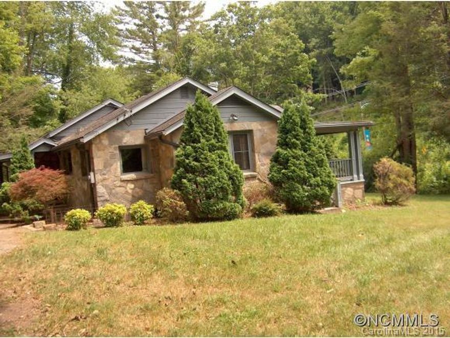 Wonderful ROCK home with BOLD Jonathan Creek running the entire length of the property! Home amenities include a large LR w/wood fireplace, separate dining, breakfast nook & galley kitchen. Main floor also has 2 bedrooms/bath & ALL w/wood floors ready for refinishing! Downstairs, there is 1452 additional square feet of bedroom/living space to finish to your liking. Convenient location, level yard & that very BOLD creek out front!!