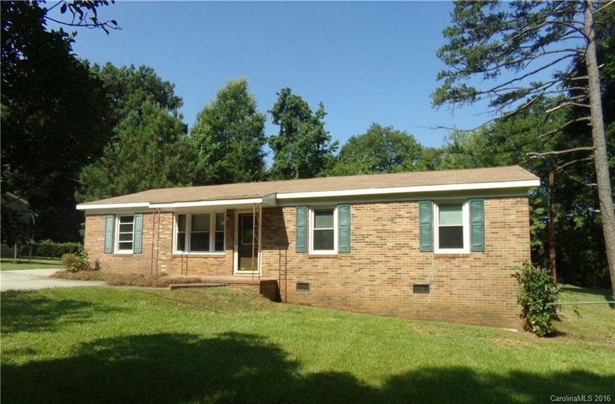 Make this attractive brick ranch located in established neighborhood, your home!  It features a large rear fenced yard and concrete driveway.  The living room is open to the spacious eat in kitchen that has access to the rear deck.  The split floor plan affords privacy to the master bedroom and bathroom.  The other two bedrooms feature hardwood floors and have easy access to the full hall bathroom.  With the former updates and your own touches, this could be what you have been looking for.