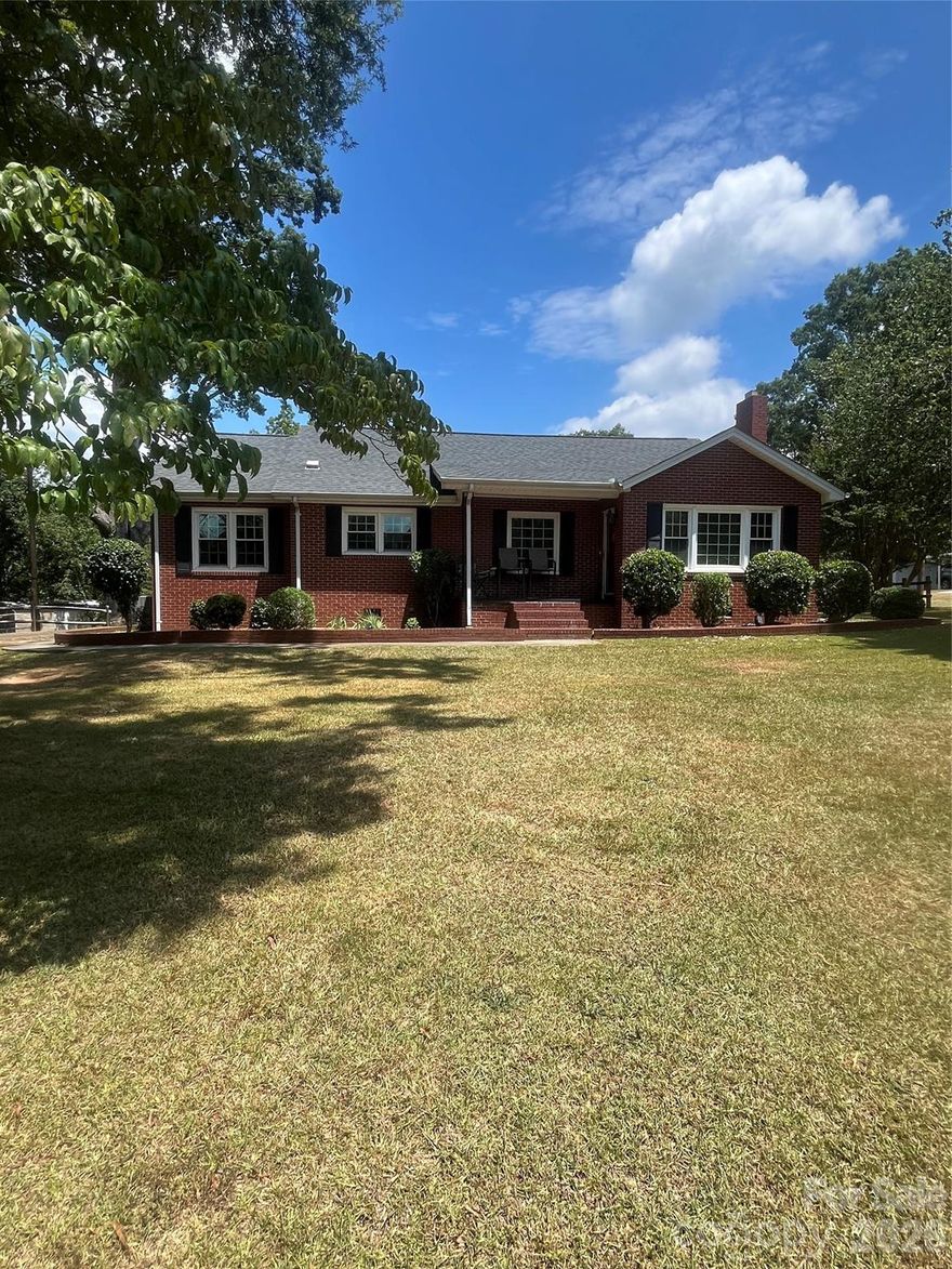 Welcome to this beautiful full-brick 3-bedroom, 2 full bath home, nestled on a generous 1.43-acre lot. This property offers the perfect blend of comfort, functionality, and outdoor enjoyment.
Inside, you'll find a spacious kitchen featuring a tile backsplash, butcher block countertops, stainless steel appliances, and ample cabinetry—ideal for cooking and entertaining. The sunroom offers a cozy space for morning coffee or afternoon reading.
The main bedroom suite includes a double vanity, soaking tub, separate shower, and a large walk-in closet—your own private retreat.
Outdoors, the property shines with mature peach and plum trees, a multi-purpose wired shed that can double as a garage or workshop, and a wooden swing set. A large deck is perfect for entertaining, while the pergola and surrounding deck around the above-ground pool provide hours of potential fun—just add a liner, and you’re ready to dive in!