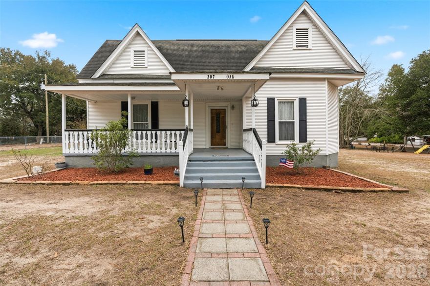 Welcome to 207 Oak Ave, a beautifully renovated historic home in Hamlet, NC, originally built in 1906. This single family home with 4 bedrooms and 2 full bathrooms is full of historic charm with modern conveniences. Nestled in the heart of downtown Hamlet, residents enjoy easy access to new and upcoming shops, restaurants, and community events located on Main St. The expansive lot, nearly an acre in size, provides ample space for gardening, entertaining, or simply soaking in the tranquil surroundings, especially under the huge magnolia tree. 

Recent updates include fresh paint and new fixtures while preserving its timeless elegance. A new HVAC system installed in 2025 guarantees year-round comfort. The fully fenced yard includes a spacious workshop and a convenient storage building, adding to the property's appeal. This unique blend of history and modernity makes 207 Oak Ave an exceptional opportunity. 

Reach out today for more details or to schedule a viewing!