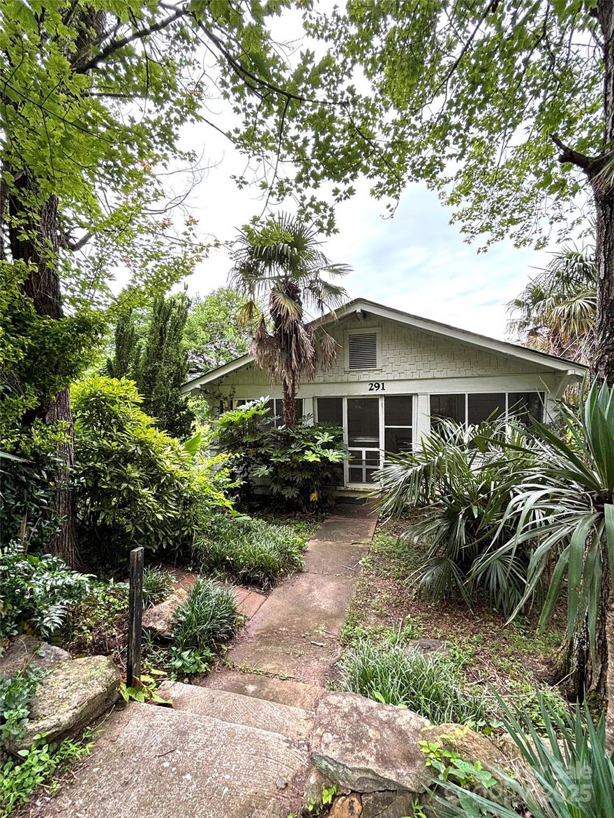 Are you looking for a fixer upper? This would be the perfect one for you, not too big and not too small. 2 Bedroom, 1 bath 576 sq ft home with a full unfinished basement, screened in porch and a very cool private yard with tropical plants. Palm trees, cactus, ferns, and wild blackberries. Located in the sweet town of Columbus right off of I-26. Medical facilities are close by and not far from a variety of shopping areas and restaurants. Property offered as part of an estate sale and is being sold "As Is".