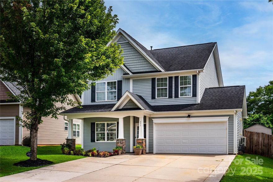 Mint condition home on a quiet cul-de-sac in desirable Jones Branch. This beautifully maintained property features a rocking chair front porch, newer hardwood-style flooring, granite countertops, stainless steel appliances, and elegant wrought iron stair accents. The open floor plan offers great flow for daily living and entertaining. Versatile flex space is ideal for a dining room or home office. Upstairs, the spacious primary suite includes two large closets and a well-appointed en-suite bath. Thoughtful upgrades include custom sliding cabinet shelves, two mini-split systems (family room and garage), a garage shop with central vacuum, and an included washer, dryer, and refrigerator. Outside, enjoy a retractable awning, a fully fenced backyard, and an additional parking pad—perfect for guests. A functional and stylish home with features designed for comfort year-round.