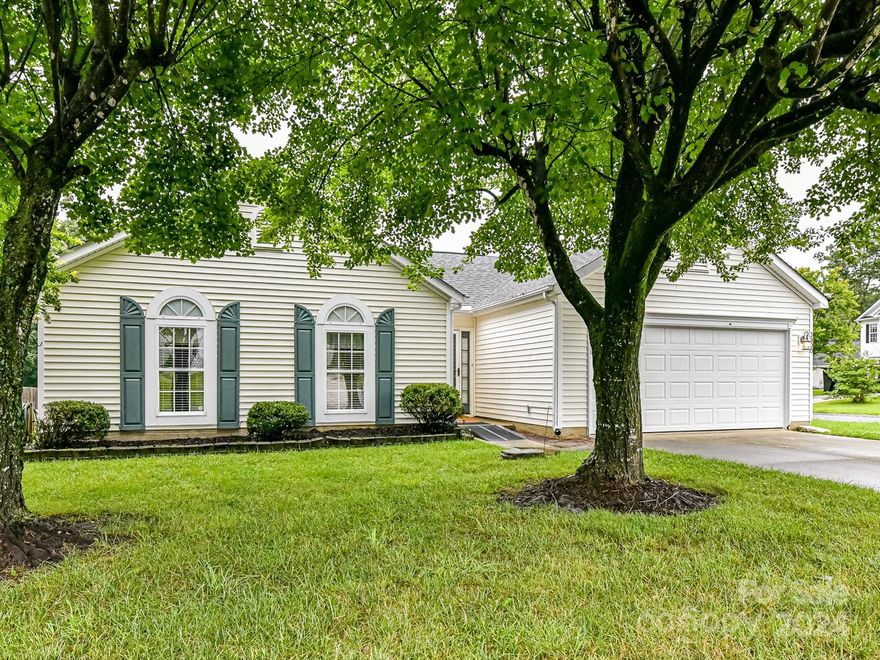 Charming 3-Bedroom Home with Spacious Yard and Outbuilding with convenient location to 485 and 74 Bypass. This home has been meticulously maintained.  Laminate Flooring throughout the Family Room, Breakfast and one of the secondary bedrooms. Kitchen w/Stainless Steel Appliances and Tile Floors.  Breakfast Area w/Door to Deck. Family Room w/Gas Logs. Primary Bedroom w/Walk-in Closet and bath. Large deck overlooking the spacious fenced backyard. TV's and Mounts will convey in the family, primary and guest room. Agent is related to seller. Don't Miss Out on this One!