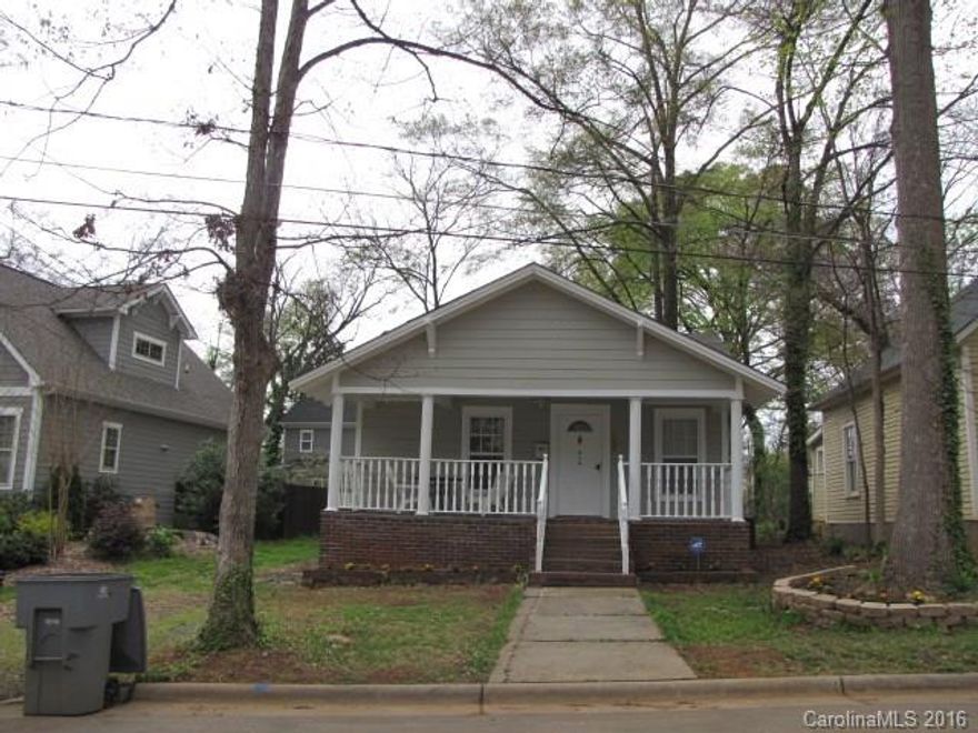 This charming 2-bedroom bungalow with a covered front porch is nestled in the middle of a newly-renovated Charlotte community. The floor plan features a living room with a brick fireplace and opens to the spacious, eat-in kitchen. The bedrooms share a full bath with a combination tub/shower, and the laundry room offers space for additional storage. Enjoy the Charlotte seasons in the over-sized backyard. This home is within walking distance to dining, parks, hospitals and more!