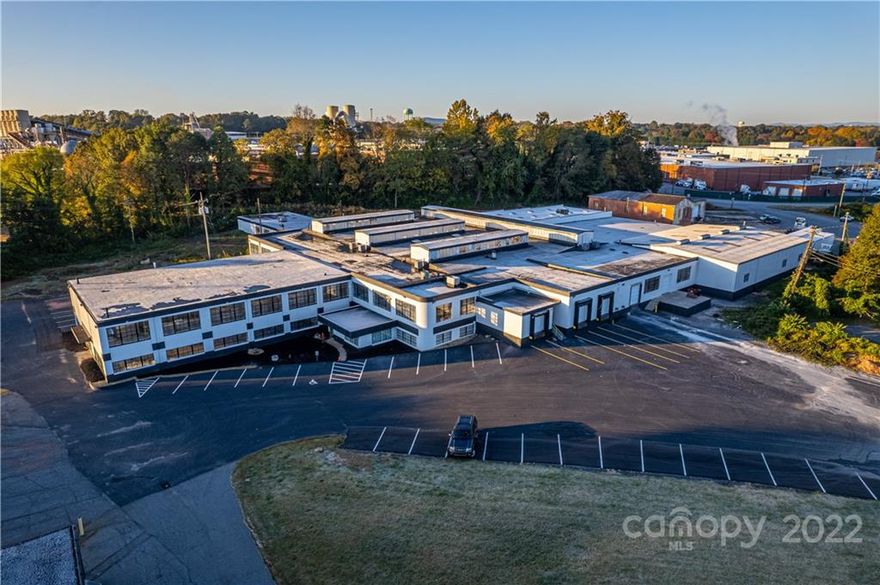 74,356 total SQ FT 12 FT Min Ceiling height 5 Loading dock doors . NEW PAINT. NEW AC. NEW ROOF SECTION. NEW ASPHALT. NEW PARKING SPACES(44).  Don't miss your chance to get a warehouse right on the new river walk the city has planned. Great natural light with new LED lights installed through out! https://youtu.be/M-IRo2pjYIE