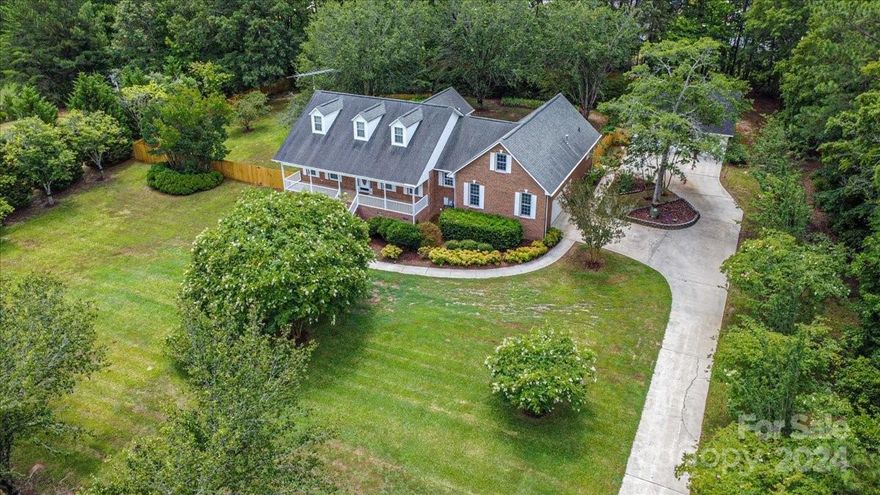 Welcome to 3508 Victorian Hill in Richburg, SC—a charming home set on a beautifully manicured 1.2-acre lot adorned with mature fruit trees and vibrant azaleas. As you arrive, you'll be greeted by a delightful front porch, ideal for relaxing and enjoying the serene surroundings. Step into the foyer that leads to a cozy living room featuring a gas fireplace, perfect for family gatherings. The extra-large sunroom provides abundant natural light and a peaceful space to unwind. Upstairs, a large bonus room over the garage offers versatile space for a home office, playroom, or guest suite. The property also includes a 2-car attached garage and an additional 2-car detached garage with extra storage space above it, ensuring ample parking and storage options. The private, fenced-in backyard is perfect for outdoor activities, featuring a back deck ideal for entertaining and enjoying the outdoors. Experience the perfect blend of elegance, comfort, and functionality at 3508 Victorian Hill!